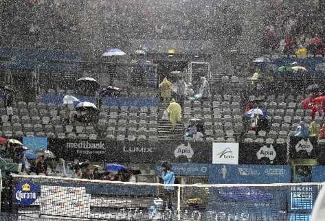 La fuerte lluvia que afecta Sydney causó que la final masculina se juegue mañana. (Foto Prensa Libre: AP)