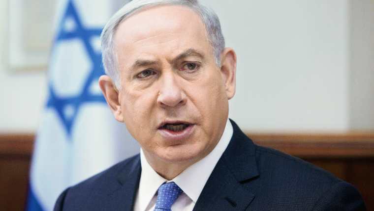 El primer ministro israelí, Benjamin Netanyahu, durante la reunión de fin de semana del gabinete de Gobierno, en Jerusalén. (Foto Prensa Libre: AP).