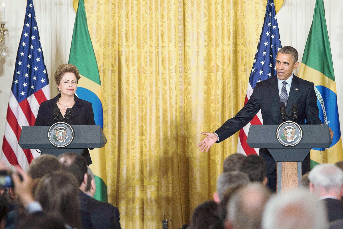 El presidente estadounidense Barack Obama y la mandataria de Brasil, Dilma Rousseff, una conferencia de prensa en la Casa Blanca. (FotoPrensa Libre:AFP).AFP