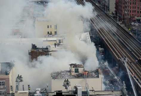 Zona donde dos edificios se derrumbaron tras explosión por fuga de gas en Harlem, en Nueva York. (Foto Prensa Libre: AFP).