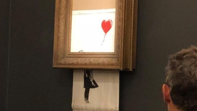 La obra de Banksy se autodestruyó tras ser vendida en una subasta. (SOTHEBY'S)