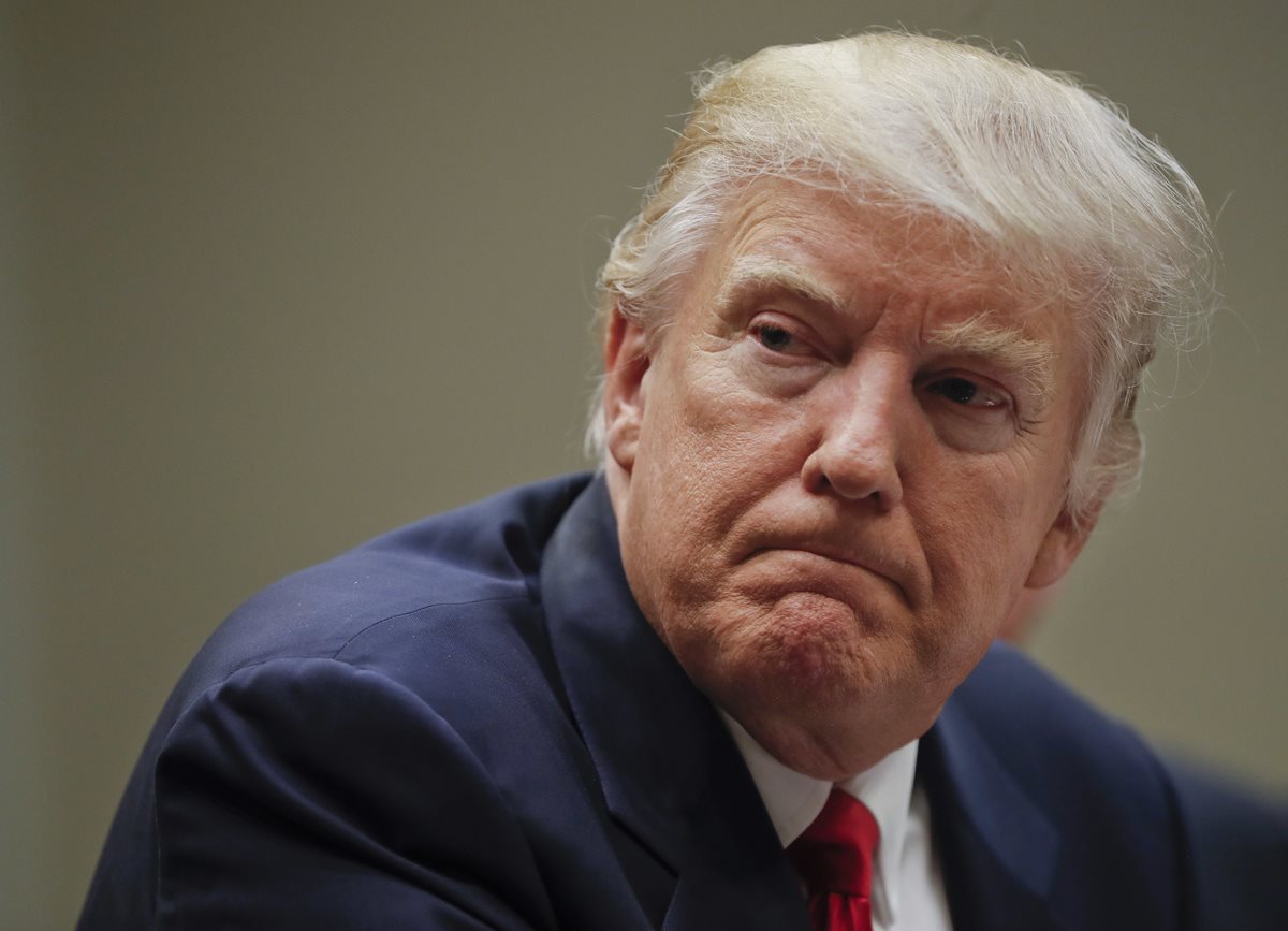 Trump participa en la audiencia con ejecutivos de compañías de seguros médicos. (AFP).