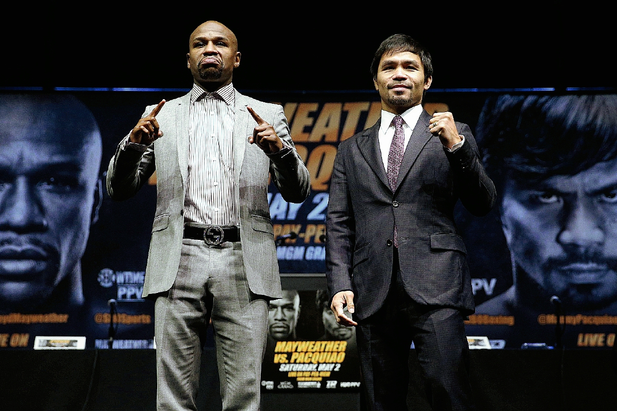 Floyd Mayweather Jr. y Manny Pacquiao, durante la presentación oficial del combate. (Foto Prensa Libre: AP)