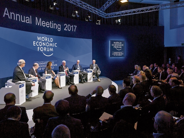 Líderes mundiales sostienen diversas reuniones con el fin de discutir temas relacionados al comercio. (Foto Prensa Libre: AFP)
