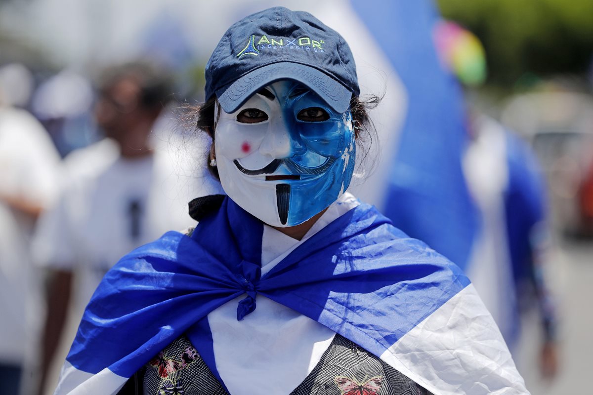 Nicaraguenses se unen en la marcha "Rescatemos la patria" (Foto Prensa Libre: EFE)
