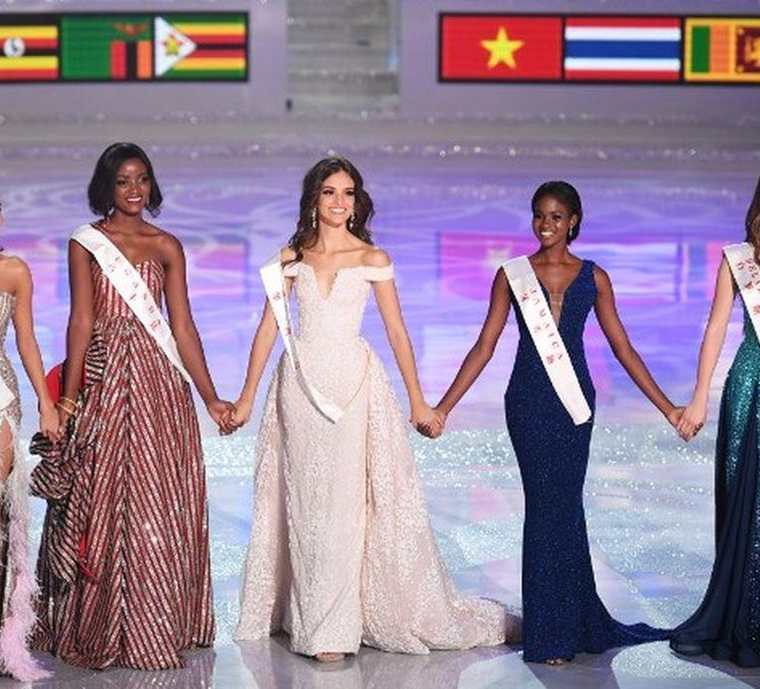 Las representantes de Bielorrusia, Jamaica, México, Tailandia y Uganda fueron las cinco finalistas de la noche. (Foto Prensa Libre: AFP)
