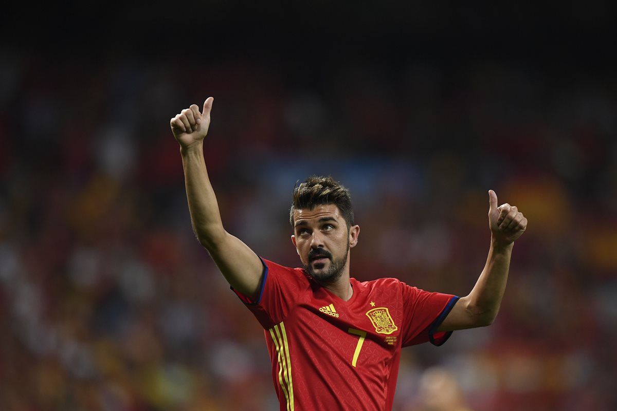 David Villa festeja el triunfo de España contra Italia, en un partido que marcó su regreso a la selección. (Foto Prensa Libre: AFP)