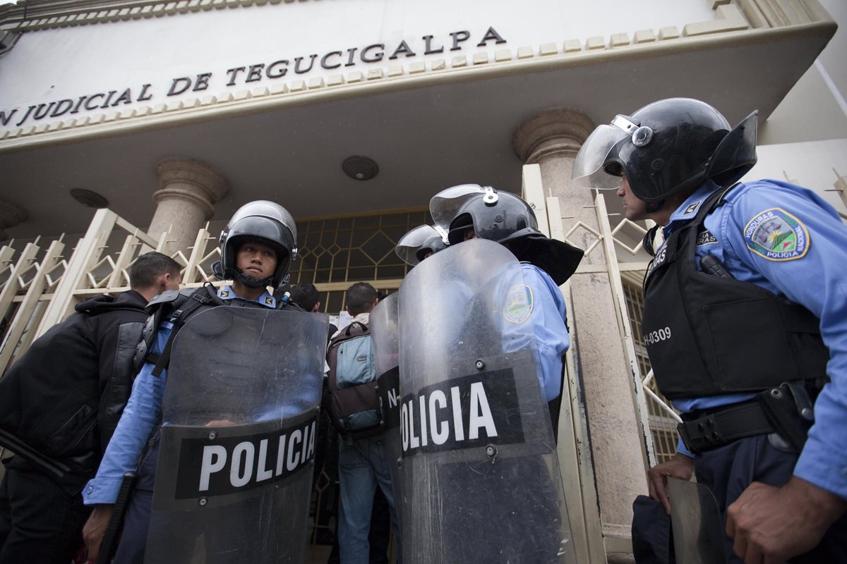 La violencia en Honduras deja un promedio de 13 homicidios a diario. (Foto Prensa Libre: EFE).