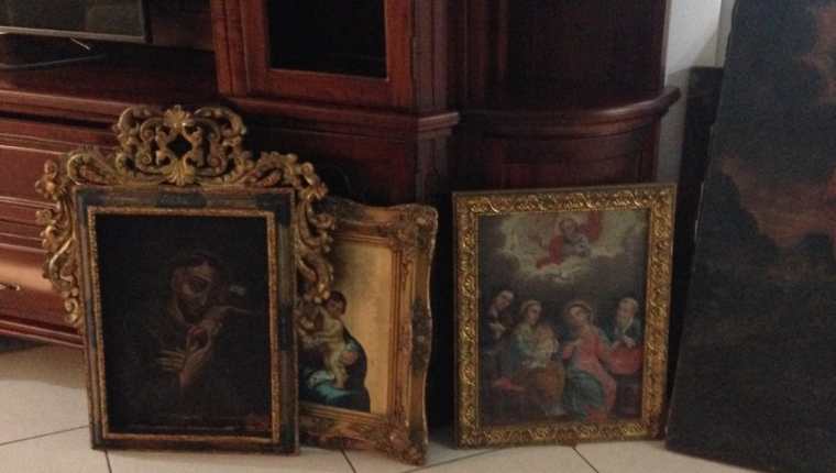Obras de arte halladas en la residencia del supuesto narcotraficante Raúl Arturo Contreras Chávez, alias Calaca o El Comisario. (Foto Prensa Libre)