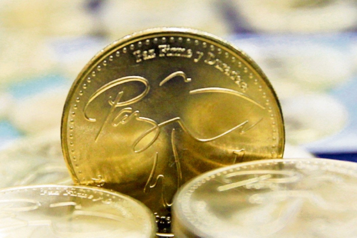 en el mercado monetario circula la nueva moneda de Q1 con diferente aleación. (FOTO PRENSA LIBRE: ERICK AVILA)