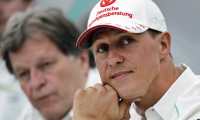 FILE - In this Thursday, Oct. 4, 2012 file photo, former Mercedes F1 driver Michael Schumacher of Germany attends a news conference to announce his retirement from Formula One at the end of 2012 in Suzuka, Japan.The condition of Michael Schumacherâ??s health will remain closely guarded among family and close associates, the former Formula One championâ??s manager Sabine Kehm said Saturday Dec. 17, 2016. (AP Photo/Shizuo Kambayashi, File)