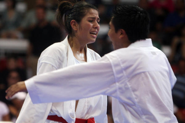 María Castellanos festeja luego de ganar la medalla de oro al vencer a la venezolana Yaisy Piña.  (Foto Prensa Libre: Fernando Ruiz)<br _mce_bogus="1"/>
