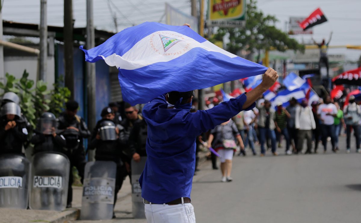 La incertidumbre por cismas de índole geopolítica, como la crisis sociopolítica que vive Nicaragua, fueron preocupaciones que externaron los ejecutIvos encuestados por PwC. (Foto Prensa Libre: AFP)