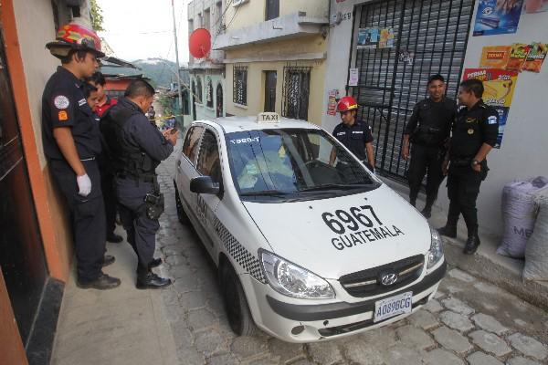 Un taxista murió víctima de un ataque armado en un sector de Tierra Nueva II, en Chinautla. (Foto Prensa Libre: P. Raquec)