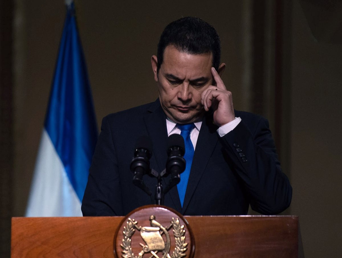 El discurso del presidente Jimmy Morales fue tibio ante la aplicación de las políticas migratorias de Donald Trump, según expertos. (Foto Prensa Libre: EFE)