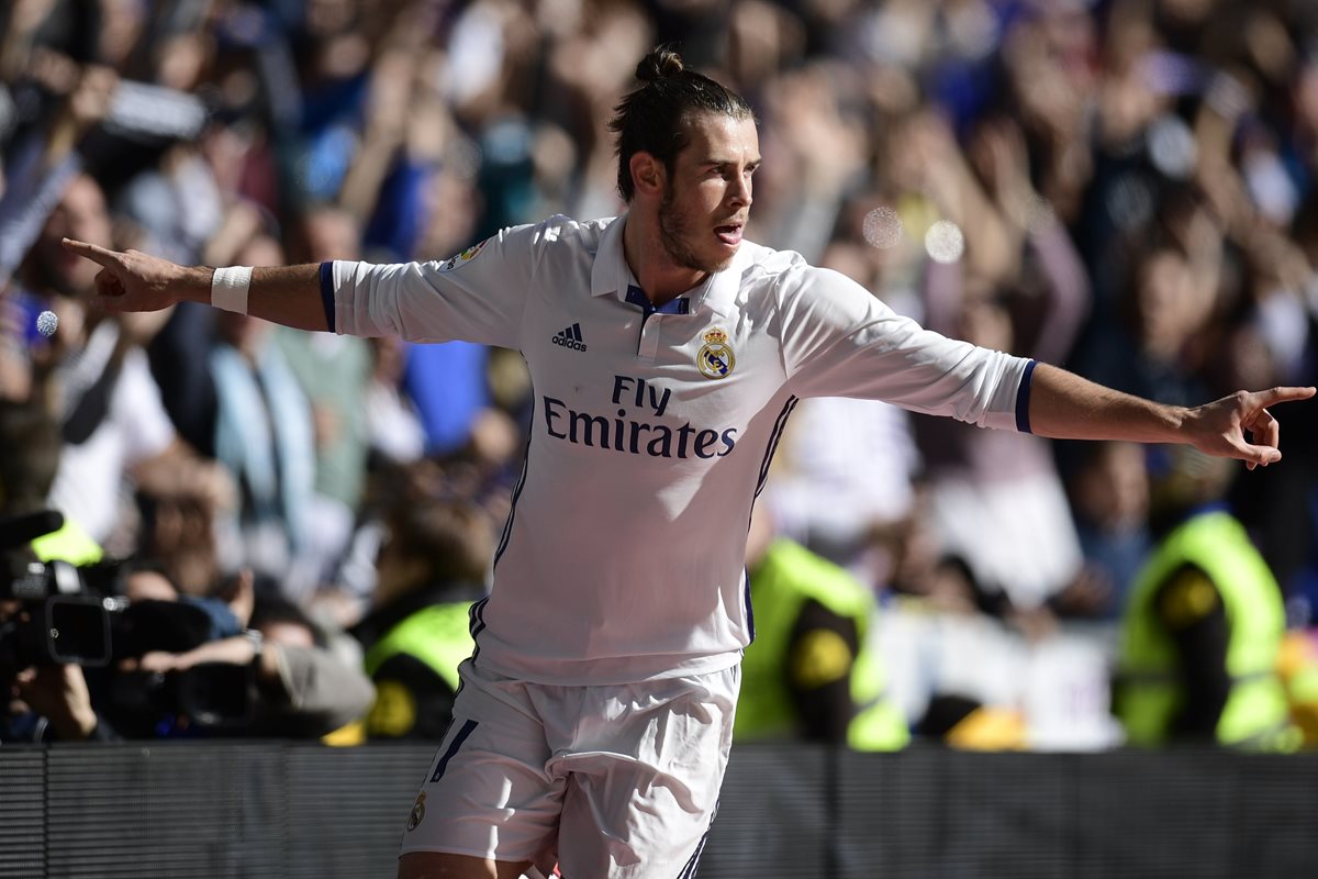 Gareth Bale festeja una de sus anotaciones contra el Leganés. (Foto Prensa Libre: AFP)