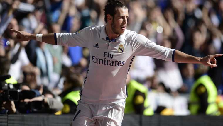 Gareth Bale festeja una de sus anotaciones contra el Leganés. (Foto Prensa Libre: AFP)