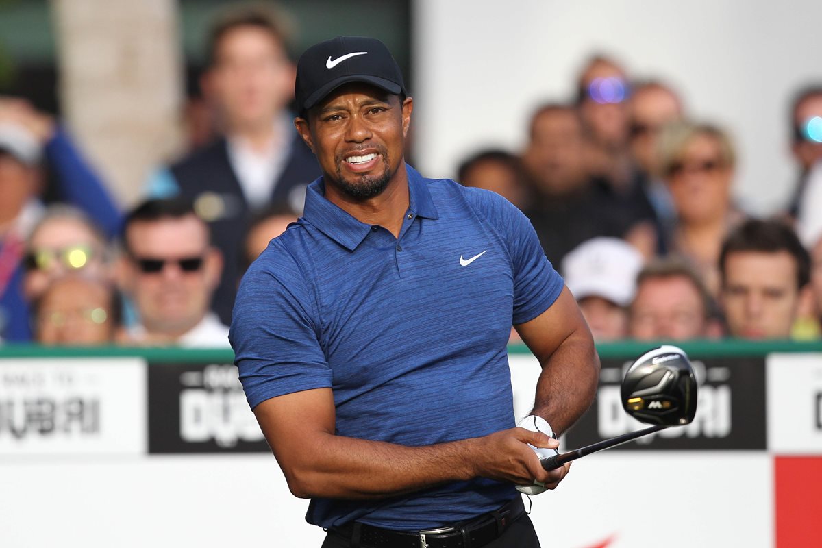El golfista estadounidense y ex número uno del mundo Tiger Woods ha sido aconsejado para limitar sus actividades. (Foto Prensa Libre: AFP)