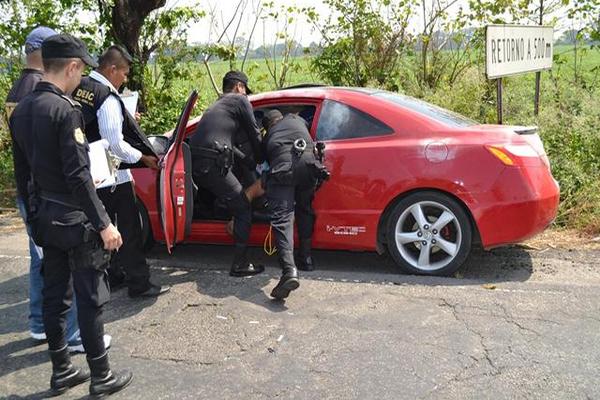 Cuerpo hallado en el km 66  de la ruta al Pacífico, Escuintla, el 24 de enero. (Foto Prensa Libre: Enrique Paredes)