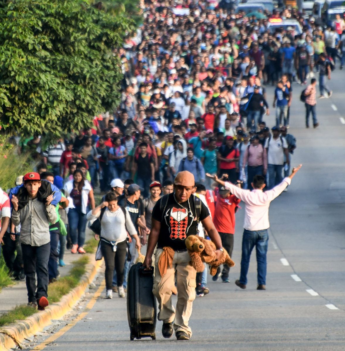 Los hondureños salen de su tierra en busca de oportunidades de trabajo. (Foto Prensa Libre: AFP)