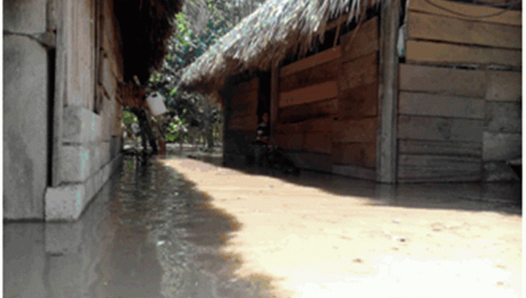 Una de las áreas inundadas en San José La Máquina, Suchitepéquez. (Foto Prensa Libre: Conred)