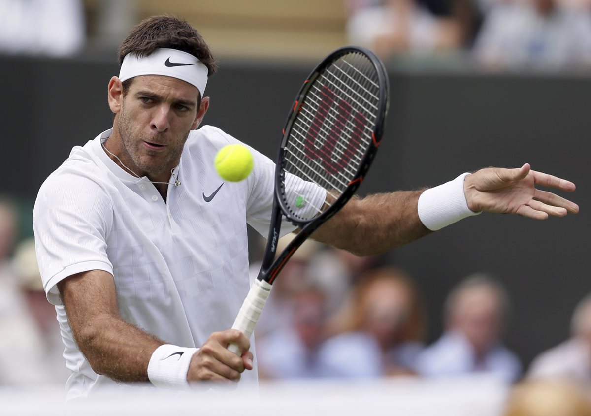 El tenista argentino, Juan Martín Del Potro, necesitó siete bolas de partido y más de 3 horas para imponerse en Wimbledon al australiano Thanasi Kokkinakis, 486 del mundo. (Foto Prensa Libre: AFP)