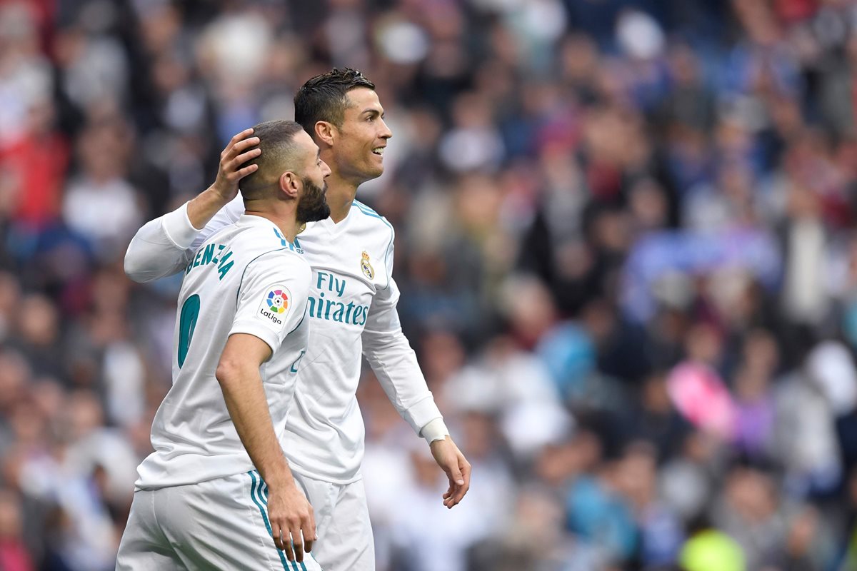 Karim Benzema y Cristiano Ronaldo dieron alegría a los aficionados del Real Madrid con sus goles. (Foto Prensa Libre: AFP)