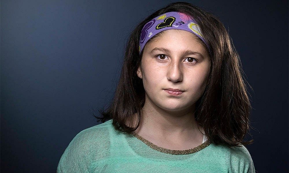 Myriam, la pequeña de 13 años cuenta la historia de cómo sobrevivió a la guerra de Siria. (AFP)