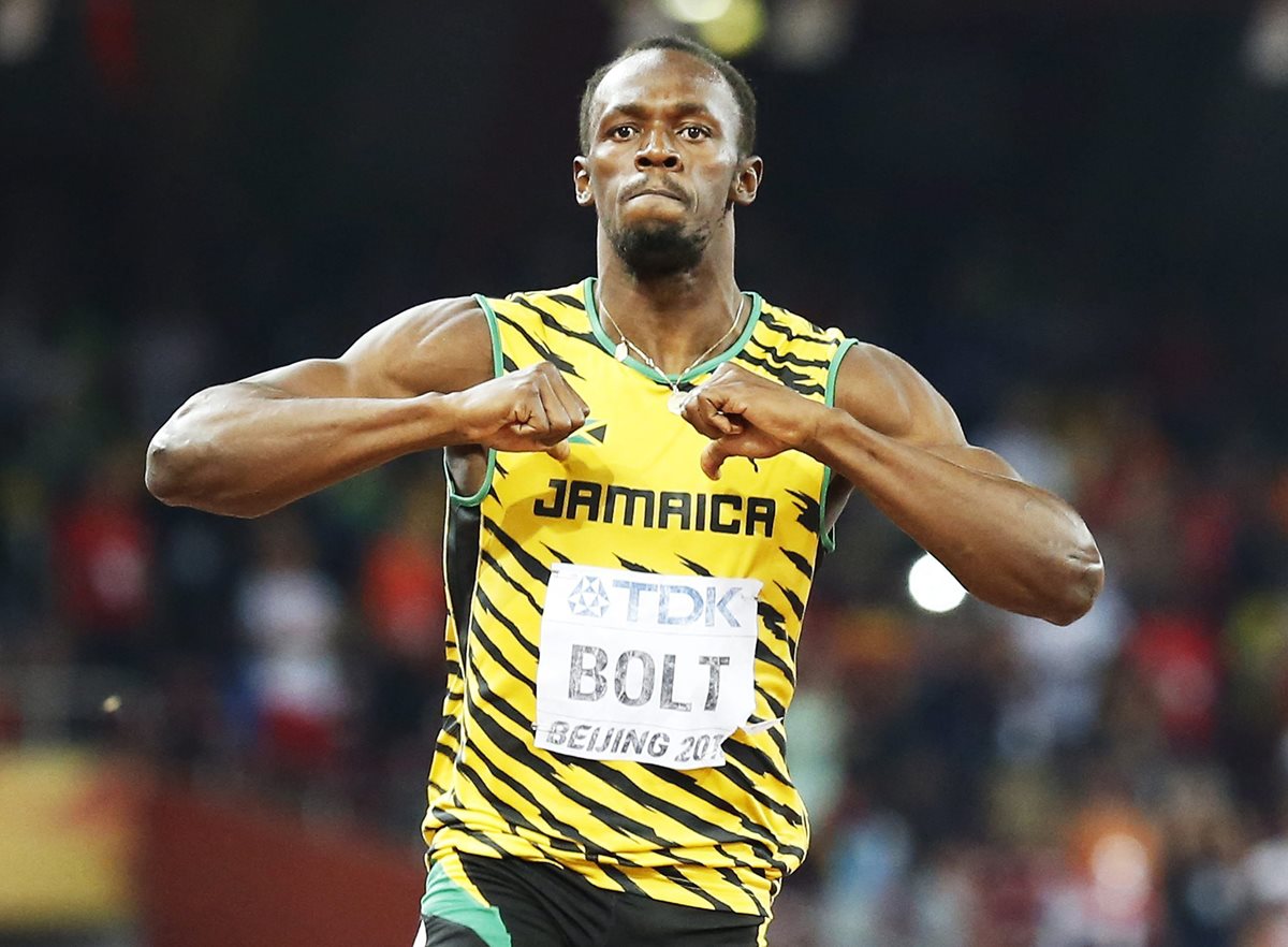 El atleta jamaicano Usain Bolt gana la final de 200 metros masculinos en el Mundial de Atletismo. (Foto Prensa Libre: EFE)