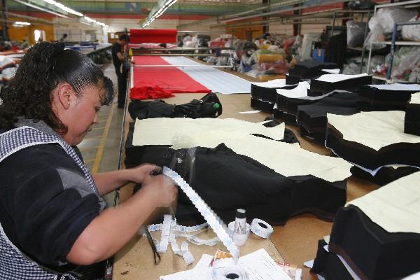 Los trabajadores de la industria de confección y textil de Honduras recibirán un ajuste del 8% para el 2014. (Foto Prensa Libre: Hemeroteca PL)