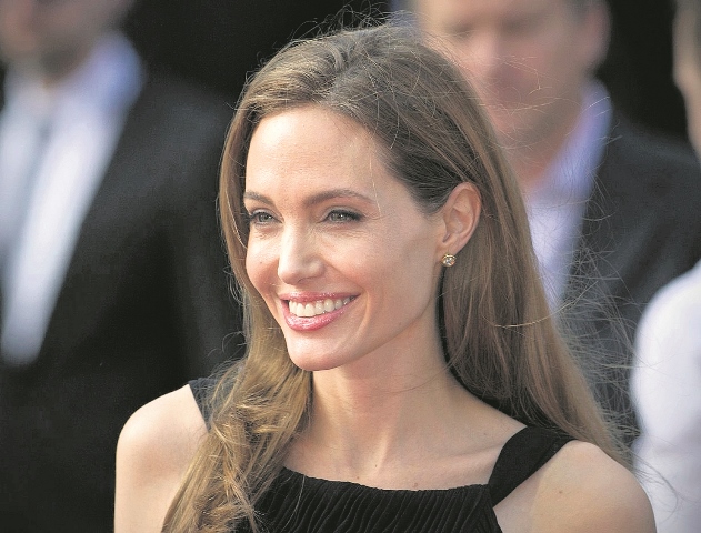 Angelina Jolie y Brad Pitt por el momento no han firmado los documentos del divorcio. (Foto Prensa Libre: AFP)