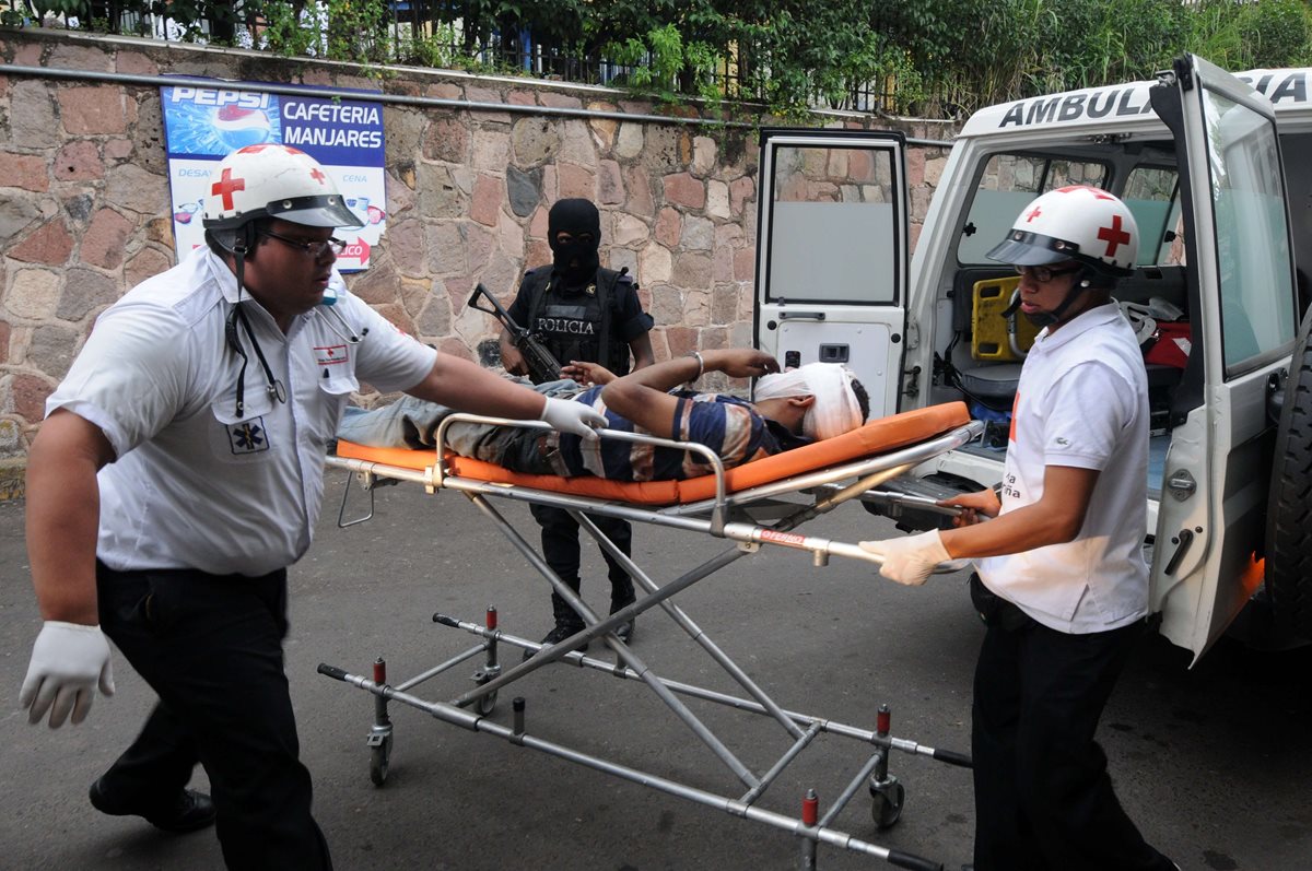 La violencia en Honduras deja una media de 13 asesinatos al día. (EFE).