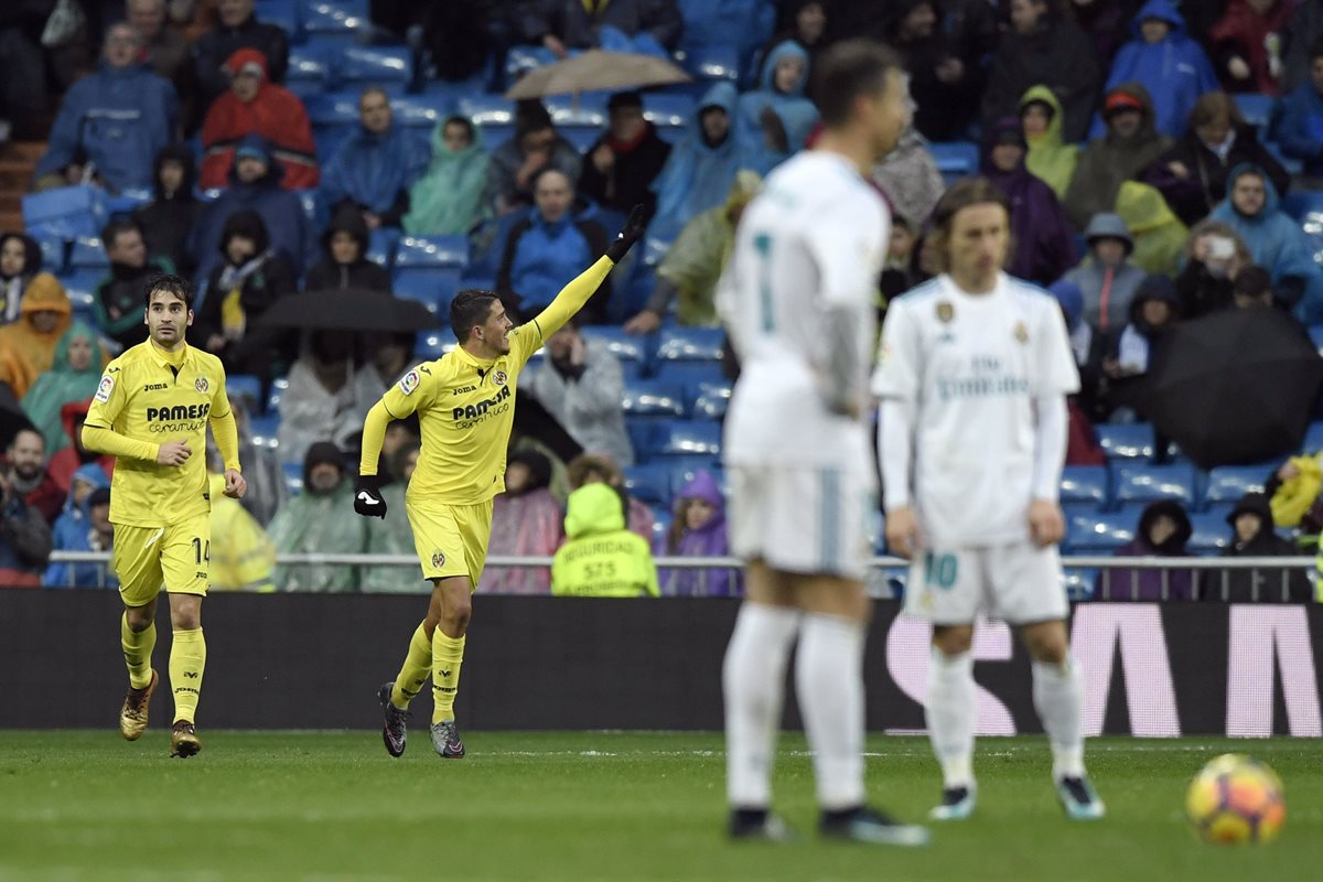 Pablo Fornals festeja luego de marcar el gol que dio el triunfo al Real Madrid, ante la frustración de Cristiano y Modric. (Foto Prensa Libre: AFP)