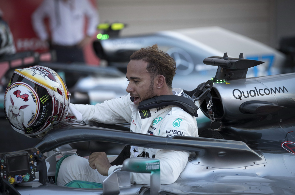 El podio británico Lewis Hamilton dio un gran paso en Japón para coronarse campeón en el Mundial de F1. (Foto Prensa Libre: AFP)
