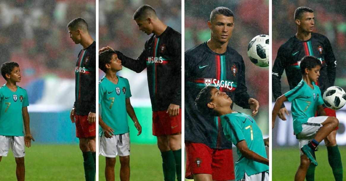 Cristiano Ronaldo y su hijo conversan sobre la gramilla del Estadio Da Luz, en Lisboa, luego del triunfo de Portual 3-0 sobre Algeria. (Foto Prensa Libre: EFE)
