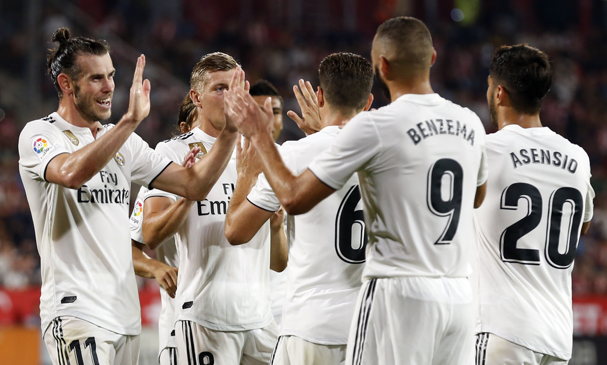 Los jugadores del Real Madrid celebran el triunfo en la segunda jornada de la Liga Española. (Foto Prensa Libre: AFP)