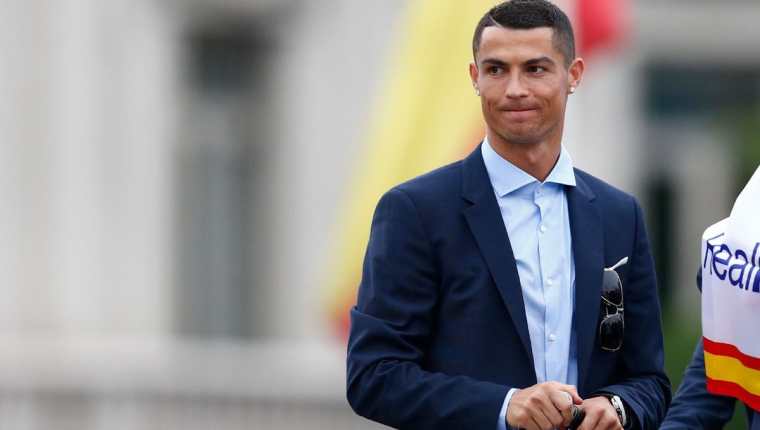 Cristiano Ronaldo ha alcanzado un acuerdo verbal con la Fiscalía de Madrid por cuatro delitos fiscales. (Foto Prensa Libre: EFE)