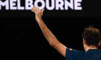 Switzerland's Roger Federer gestures to the crowd as he leaves the court after his defeat against Greece's Stefanos Tsitsipas during their men's singles match on day seven of the Australian Open tennis tournament in Melbourne on January 20, 2019. (Photo by Jewel SAMAD / AFP) / -- IMAGE RESTRICTED TO EDITORIAL USE - STRICTLY NO COMMERCIAL USE --