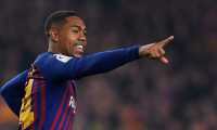 Barcelona's Brazilian midfielder Malcom celebrates after scoring during the Spanish Copa del Rey (King's Cup) semi-final first leg football match between FC Barcelona and Real Madrid CF at the Camp Nou stadium in Barcelona on February 6, 2019. (Photo by LLUIS GENE / AFP)