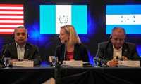 United States Secretary of Homeland Security (DHS) Kirstjen Nielsen (C) Honduran Security Minister Julian Pacheco Tinoco (R) and El Salvador's Security Minister Mauricio Ramirez Landaverde, attend the opening of the fourth meeting of security ministers of the "Northern Triangle" in San Salvador, on February 20, 2019. - Nielsen called on Guatemala, El Salvador and Honduras security ministers to stop new caravans of migrants who illegally try to reach the US. (Photo by MARVIN RECINOS / AFP)