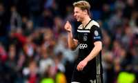 Ajax's Dutch midfielder Frenkie de Jong celebrates at the end of the UEFA Champions League round of 16 second leg football match between Real Madrid CF and Ajax at the Santiago Bernabeu stadium in Madrid on March 5, 2019. (Photo by GABRIEL BOUYS / AFP)