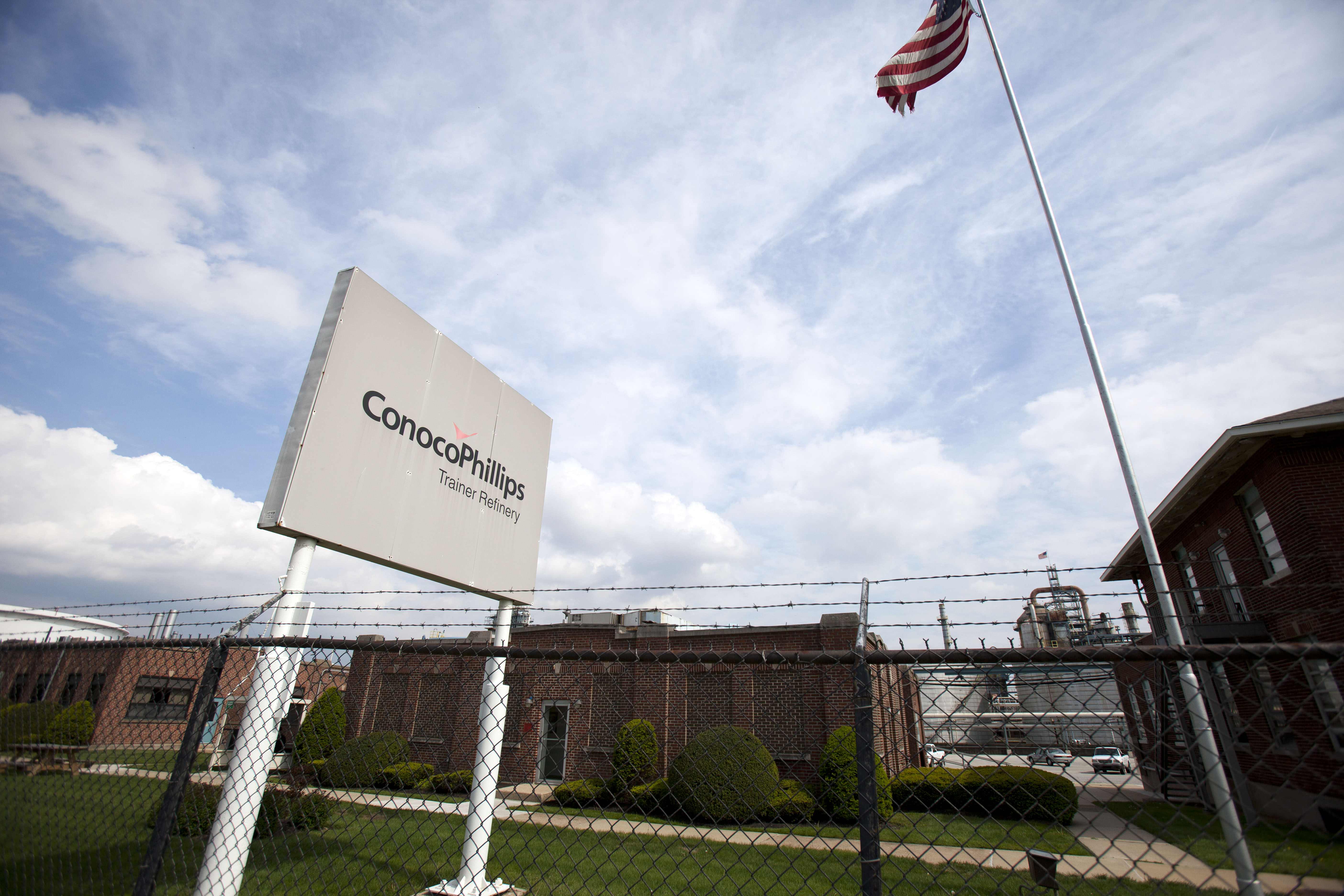 (FILES) In this file photo taken on May 1, 2012, a sign stands in front of the ConocoPhillips oil refinery in Trainer, Pennsylvania. - A World Bank arbitration panel on March 8, 2019, ordered Venezuela to pay oil major ConocoPhillips $8.7 billion for the expropriation of its operations in June 2007. (Photo by Jessica Kourkounis / GETTY IMAGES NORTH AMERICA / AFP)