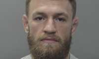 This booking photo obtained on March 12, 2019 courtesy of the City of Miami Beach Police Department shows mixed martial arts fighter Conor McGregor. - Mixed martial arts fighter Conor McGregor was arrested March 11, 2019 by US police for allegedly smashing a fan's cell phone outside a Florida nightclub. The 30-year-old Irishman was charged with criminal mischief and strong-armed robbery after Miami police said he allegedly slapped the phone out of the fan's hand and then stomped on it. Miami Beach police said they were called to the scene outside the LIV Nightclub at 5:00 am (0900 GMT), The Miami Herald reported. The police started their investigation and McGregor was arrested later that day at a nearby home and then booked into the Miami-Dade jail. (Photo by HO / City of Miami Beach Police Department / AFP) / RESTRICTED TO EDITORIAL USE - MANDATORY CREDIT "AFP PHOTO / CITY OF MIAMI BEACH POLICE DEPARTMENT/HANDOUT" - NO MARKETING NO ADVERTISING CAMPAIGNS - DISTRIBUTED AS A SERVICE TO CLIENTS