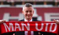 Manchester United's Norwegian manager Ole Gunnar Solskjaer poses during a photo call at Old Trafford in Manchester, northwest England, on March 28, 2019 after it was announced that he was appointed as the clubs full-time manager on a three-year contract. - Ole Gunnar Solskjaer said he was "beyond excited" to be handed the Manchester United manager's job on a full-time basis as the club announced on Thursday he had signed a three-year deal. (Photo by Oli SCARFF / AFP) / RESTRICTED TO EDITORIAL USE. No use with unauthorized audio, video, data, fixture lists, club/league logos or 'live' services. Online in-match use limited to 75 images, no video emulation. No use in betting, games or single club/league/player publications. /