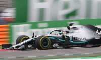 Mercedes' British driver Lewis Hamilton takes a corner during the Formula One Chinese Grand Prix in Shanghai on April 14, 2019. (Photo by Greg Baker / AFP) / The erroneous mention[s] appearing in the metadata of this photo by HU CHENGWEI has been modified in AFP systems in the following manner: [byline as Greg BAKER/STF] instead of [HU Chengwei/POOL]. Please immediately remove the erroneous mention[s] from all your online services and delete it (them) from your servers. If you have been authorized by AFP to distribute it (them) to third parties, please ensure that the same actions are carried out by them. Failure to promptly comply with these instructions will entail liability on your part for any continued or post notification usage. Therefore we thank you very much for all your attention and prompt action. We are sorry for the inconvenience this notification may cause and remain at your disposal for any further information you may require.