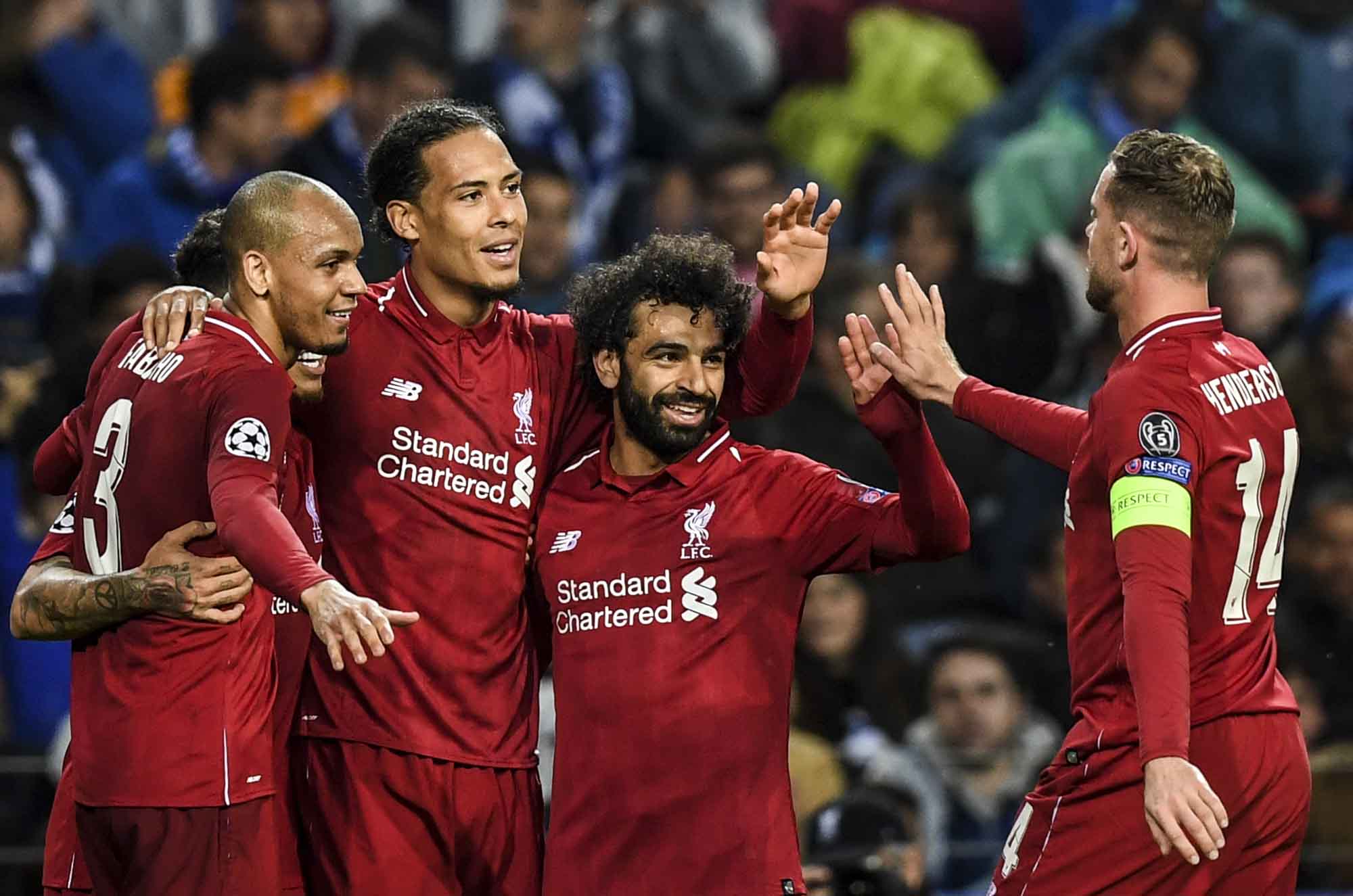 Los jugadores del Liverpool celebran la clasificación a las semifinales de la Champions League. (Foto Prensa Libre: AFP)