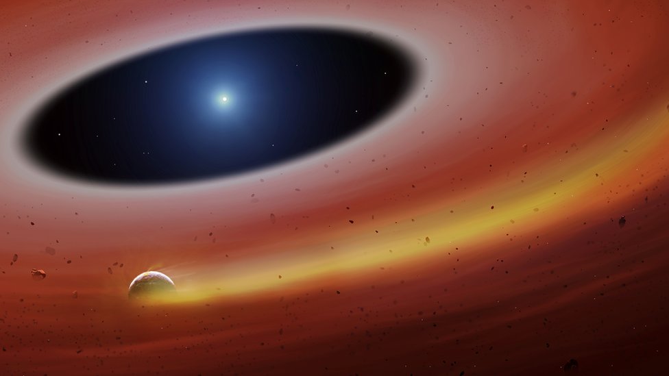 Representación artística de un fragmento planetario orbitando a la estrella SDSS J122859.93+104032.9 dejando una estela de gas tras él. UNIVERSITY OF WARWICK / MARK GARLICK