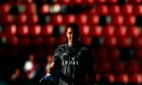 Real Madrid's Costa Rican goalkeeper Keylor Navas walks on the pitch before the Spanish League football match between Rayo Vallecano and Real Madrid at the Vallecas Stadium in the Madrid district of Puente de Vallecas on April 28, 2019. (Photo by Benjamin CREMEL / AFP)