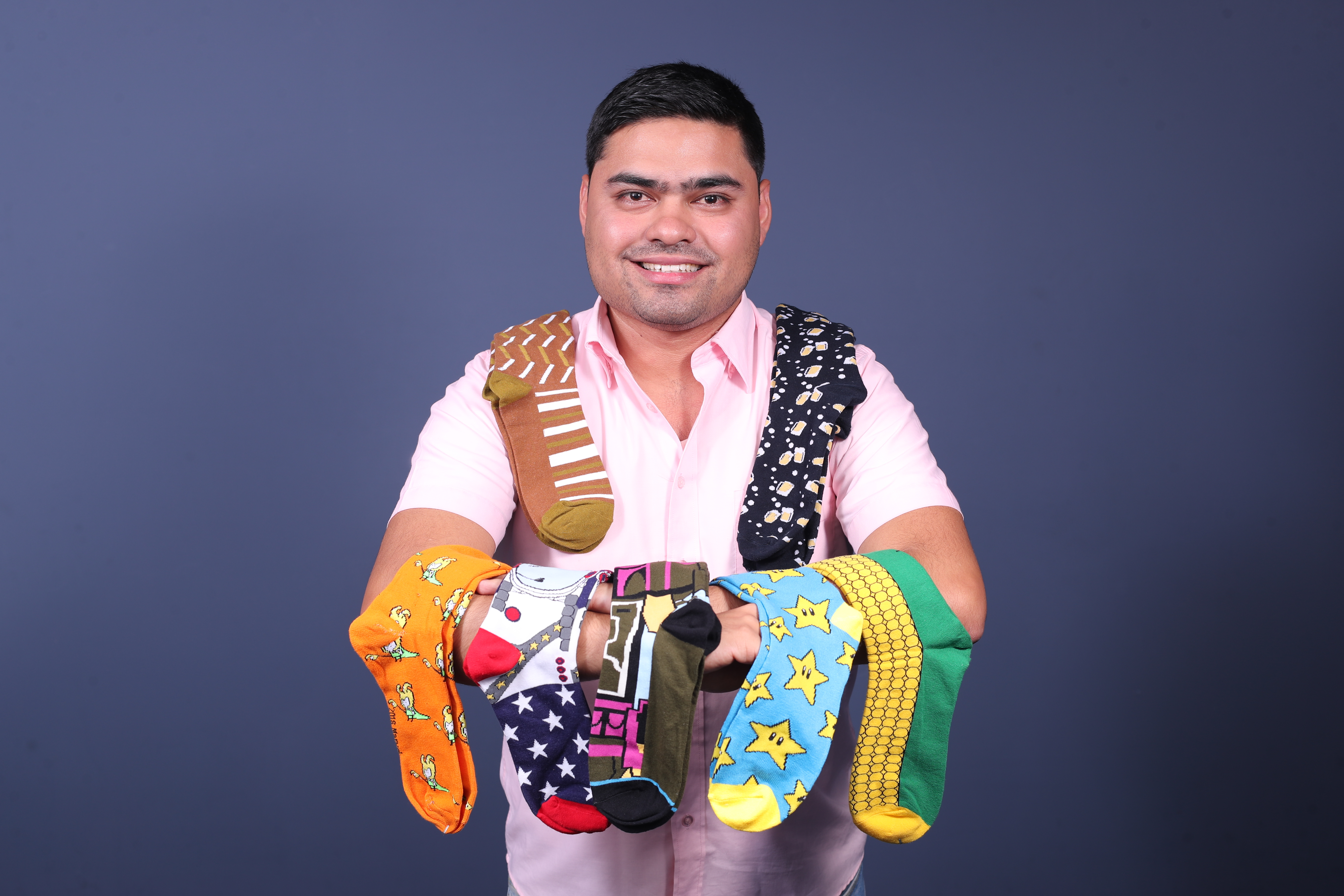 Érick René Ochoa Reyes, creador de Monopatía, empresa dedicada a la fabricación y diseño de calcetines con temas originales y que identifican a los guatemaltecos.