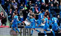 Getafe's Spanish forward Jorge Molina (L) celebrates with teammates after scoring his team's second goal during the Spanish League football match between Getafe and Sevilla at the Coliseum Alfonso Perez in Getafe on April 21, 2019. (Photo by BENJAMIN CREMEL / AFP)